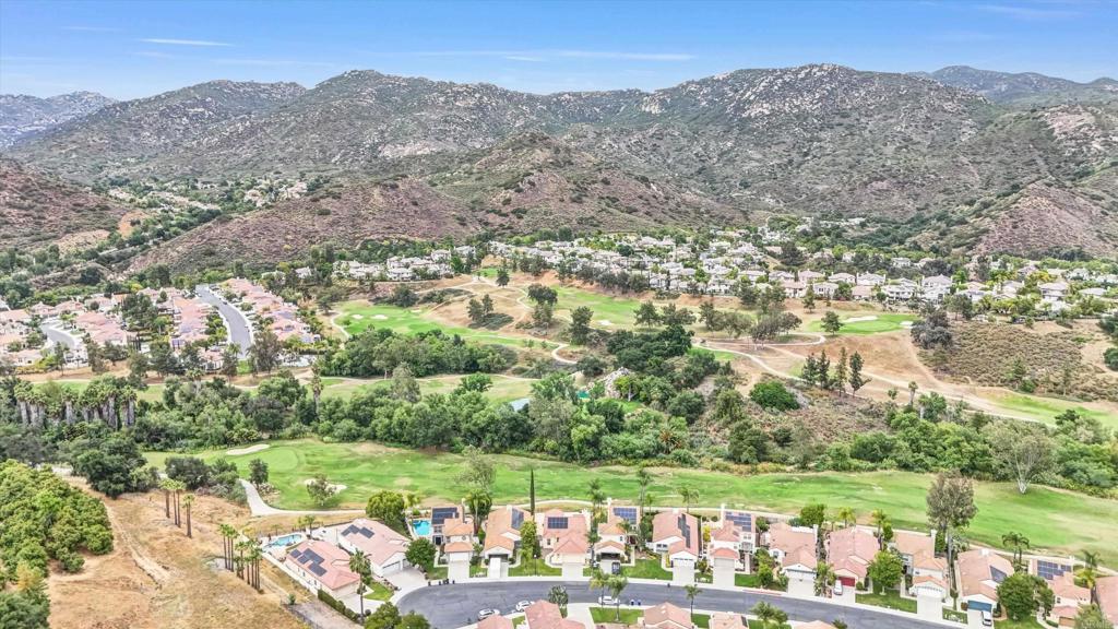 2318 Fallbrook Place Escondido, CA 92027 - Photo 33 of 34 an aerial view of residential houses with outdoor space and street view