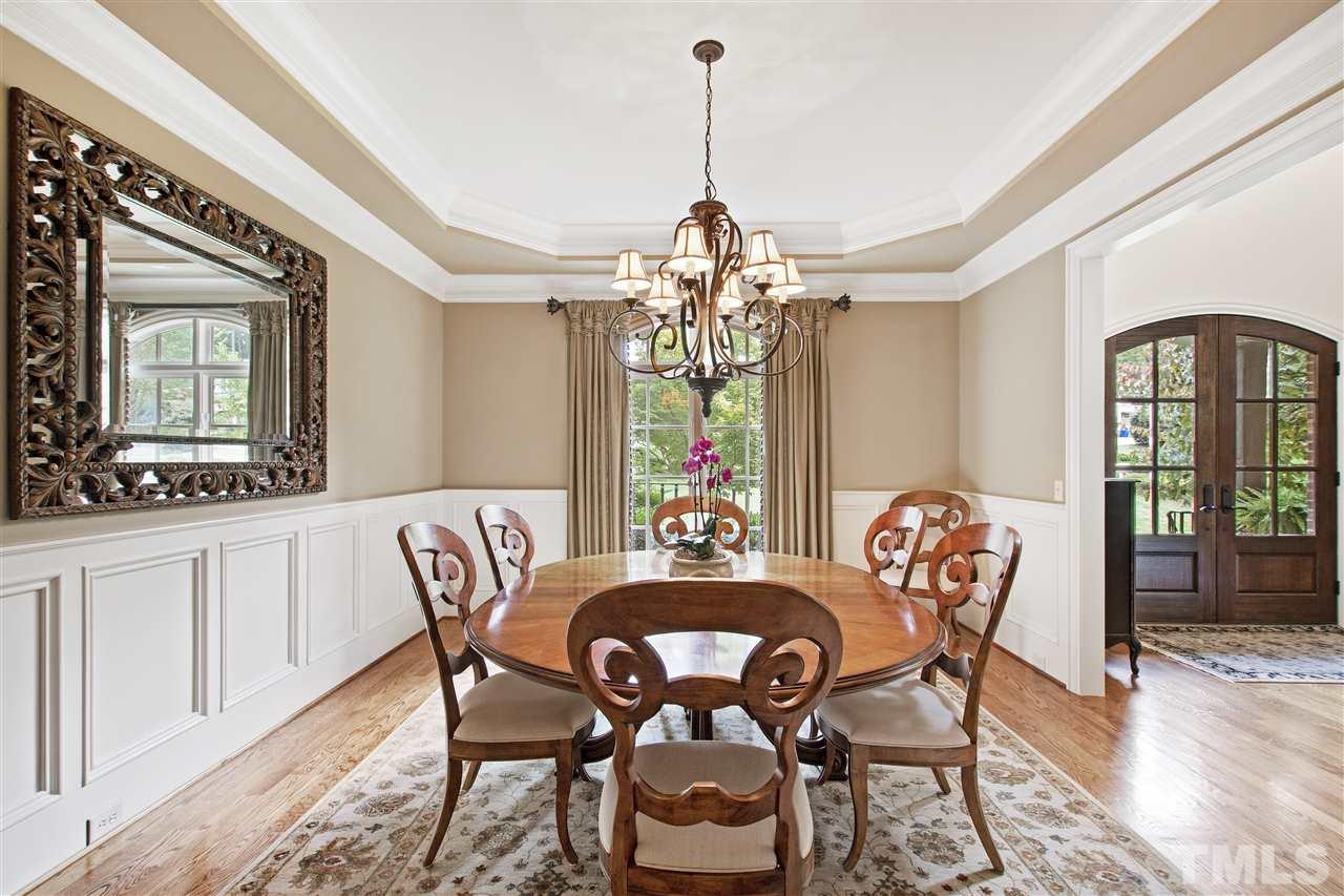 1512 Consett Court Raleigh, NC 27613 - Photo 11 of 30 Formal dining room with trey ceiling and wainscoting