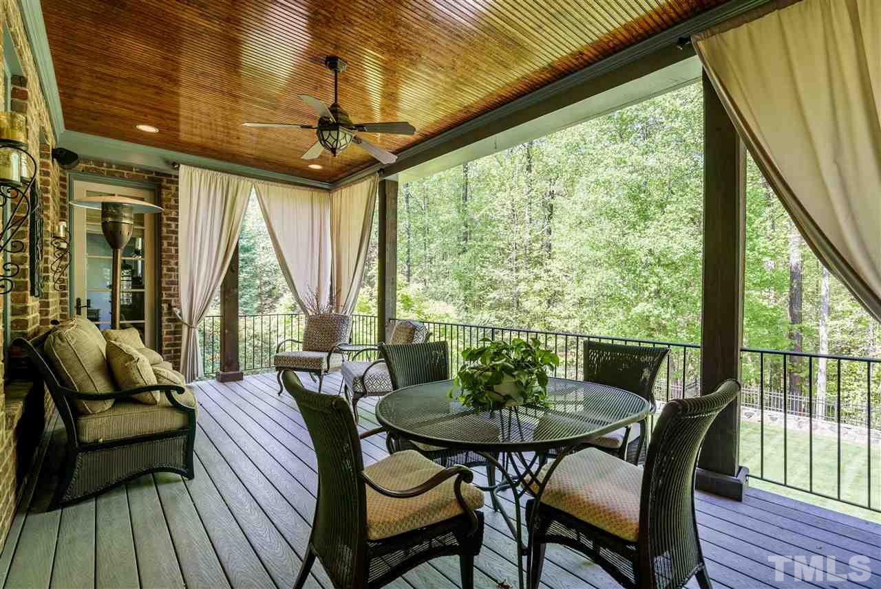 1512 Consett Court Raleigh, NC 27613 - Photo 13 of 30 Covered porch with French door to main floor living room
