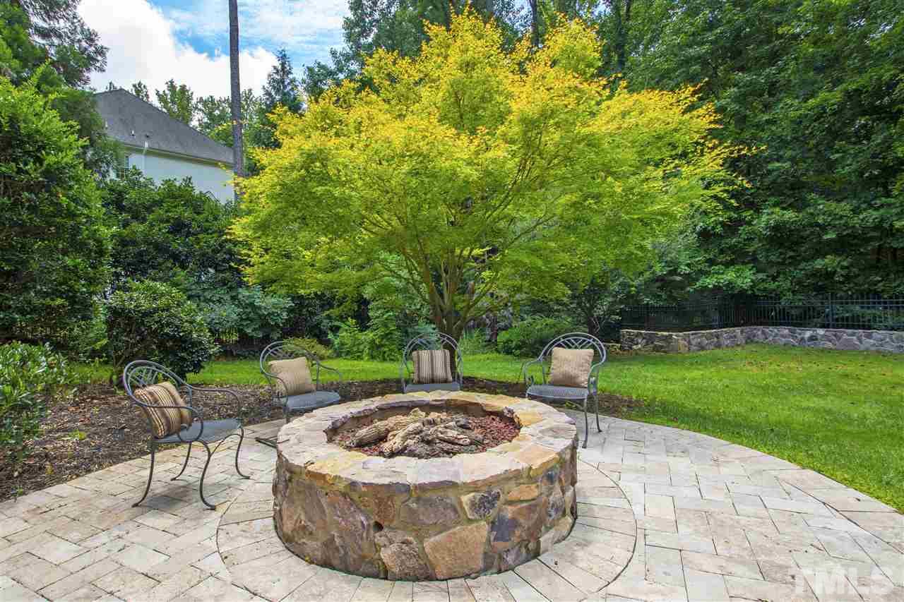 1512 Consett Court Raleigh, NC 27613 - Photo 28 of 30 Large basement level patio with gas fire pit