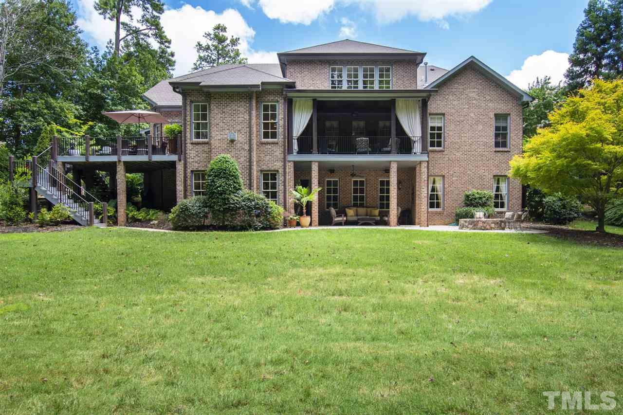 1512 Consett Court Raleigh, NC 27613 - Photo 29 of 30 Exterior back shows all of the outdoor living spaces home has to offer.