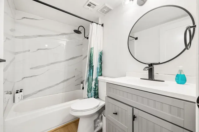 a view of a house with backyard sitting area and swimming pool