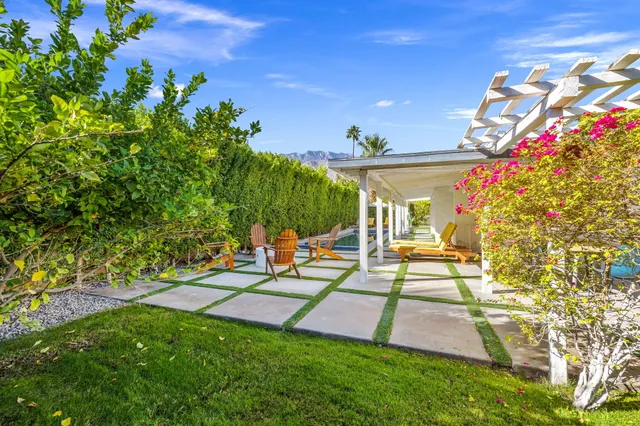 a view of a house with swimming pool