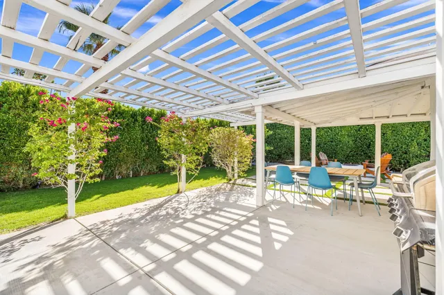 a view of a house with pool on the patio