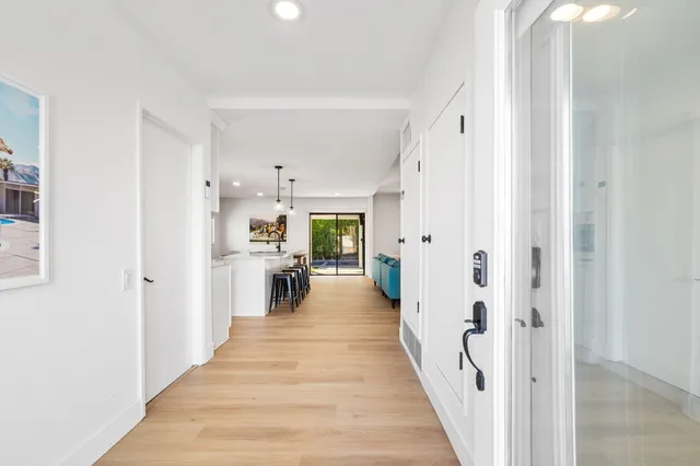 a view of a living room with windows