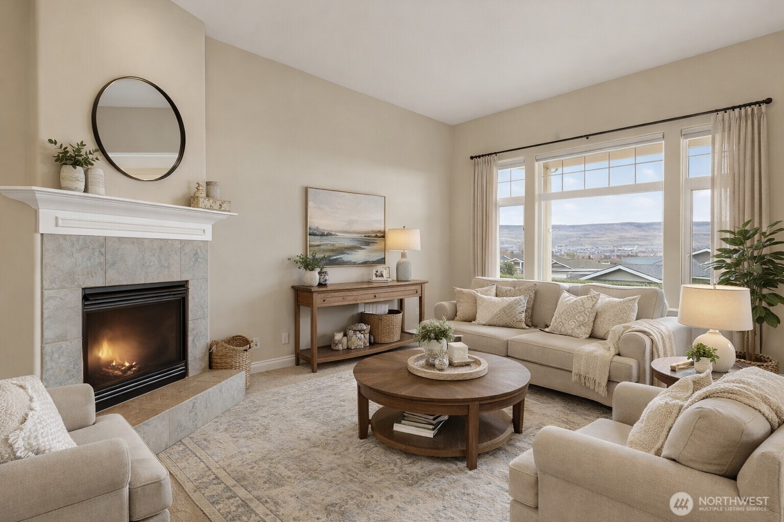 1845 Maple Street, Unit 26 Wenatchee, WA 98801 - Photo 2 of 40 a living room with furniture a fireplace a rug and a large window