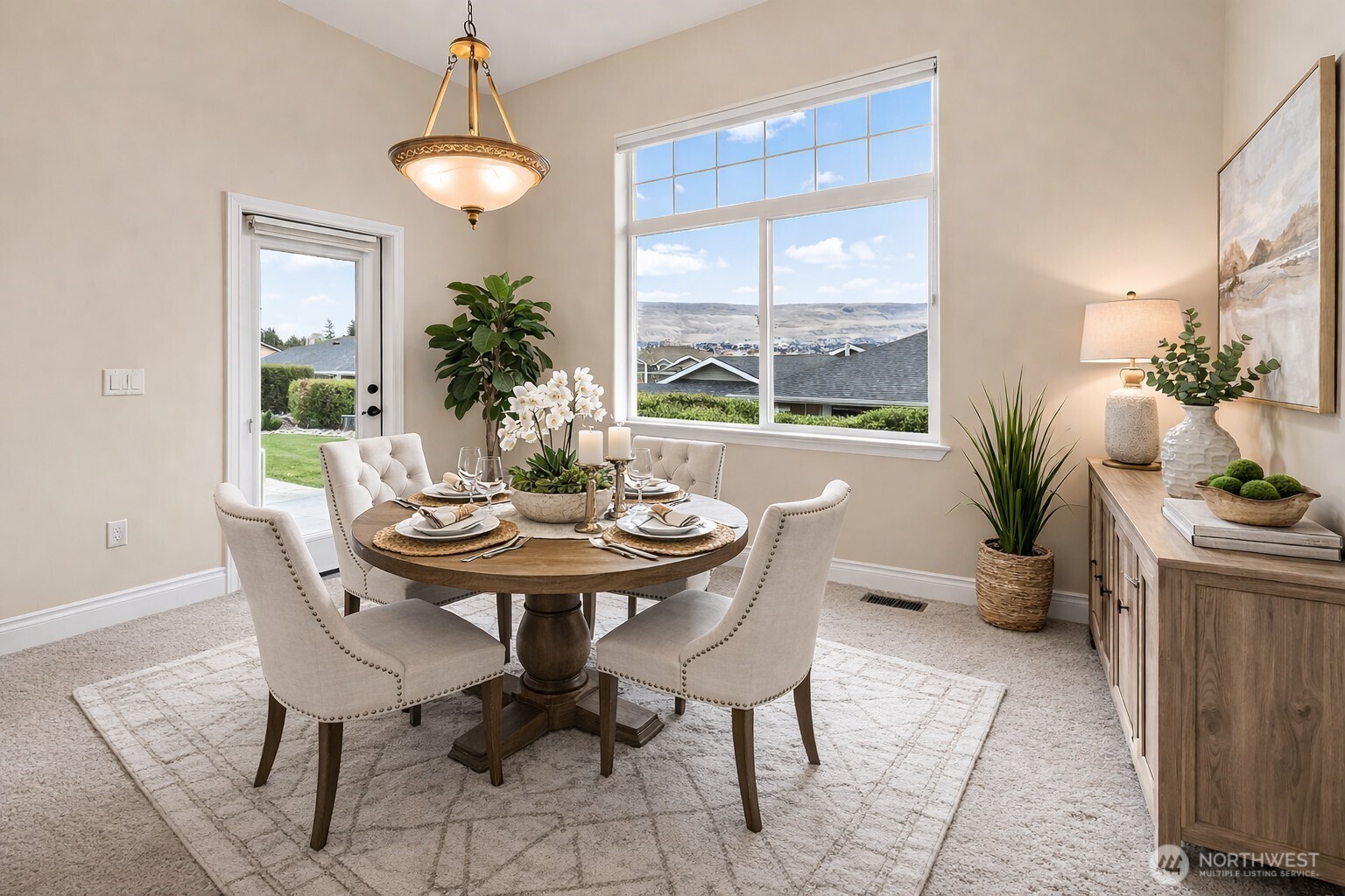 1845 Maple Street, Unit 26 Wenatchee, WA 98801 - Photo 5 of 40 a view of a dining room with furniture window and outside view