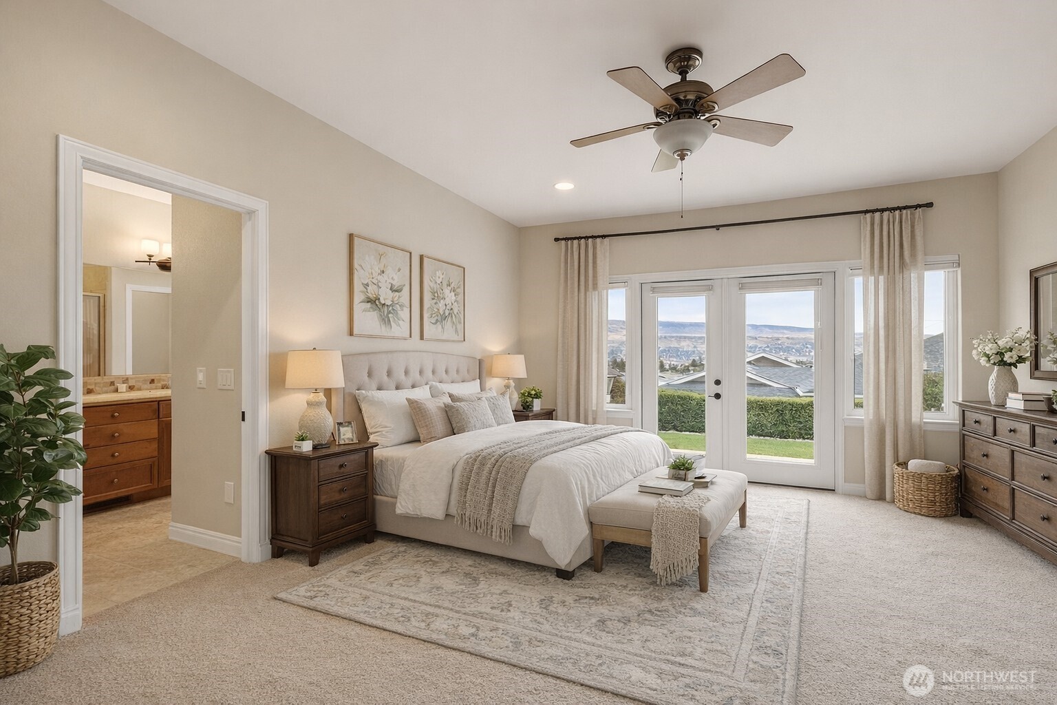 1845 Maple Street, Unit 26 Wenatchee, WA 98801 - Photo 6 of 40 a spacious bedroom with a bed and a large window