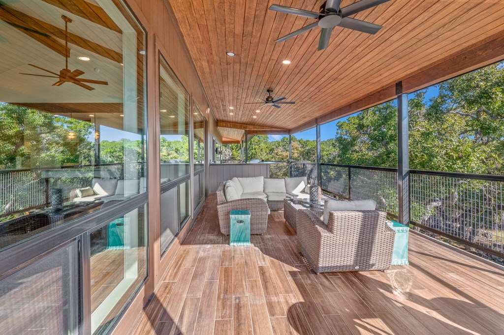 199 Hermosa Road Southwest Hunt, TX 78024 - Photo 23 of 59 a view of a patio with a table chairs and a table