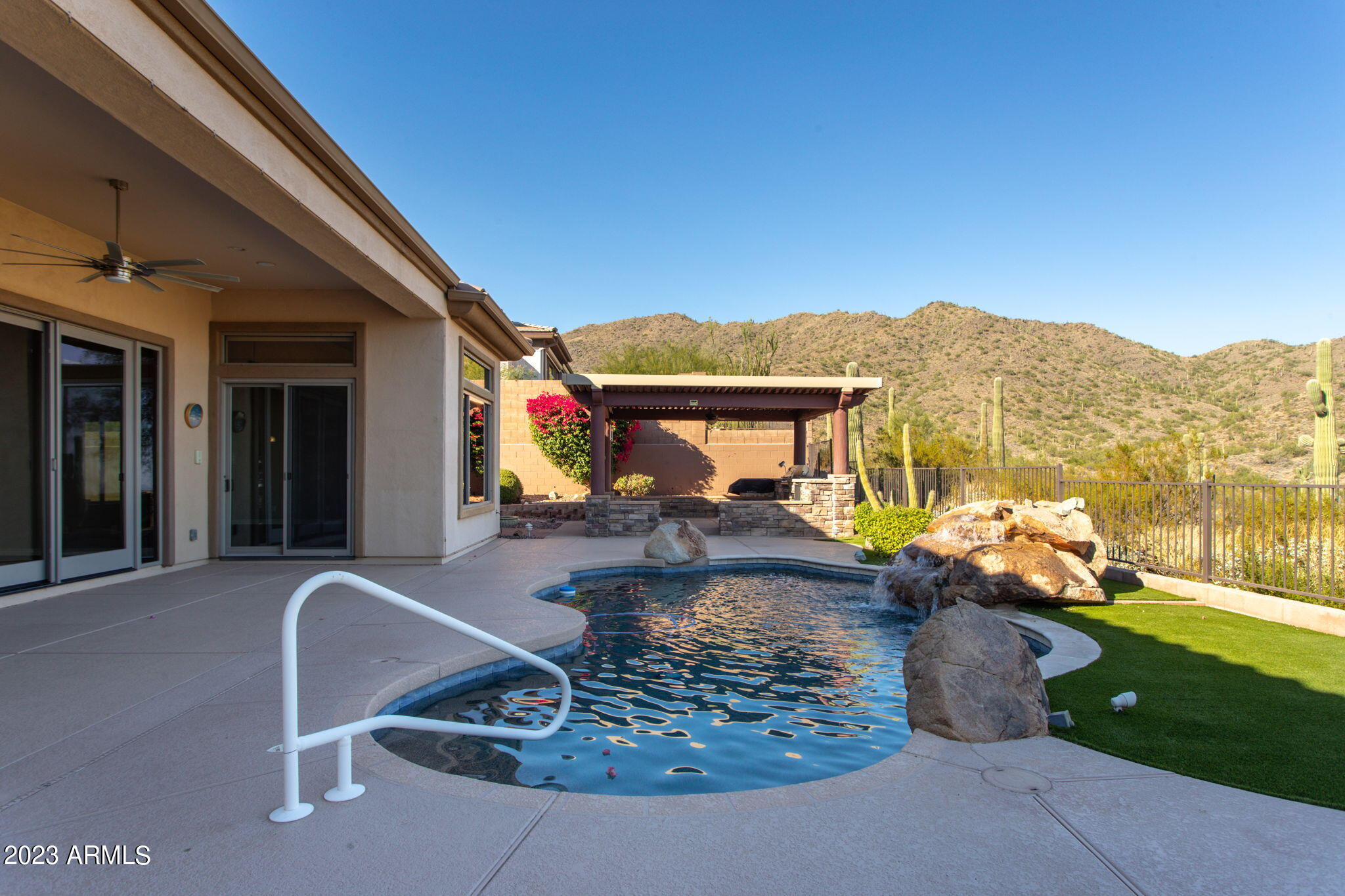 42409 North Back Creek Way Anthem, AZ 85086 - Photo 54 of 87 a front view of a house with a yard