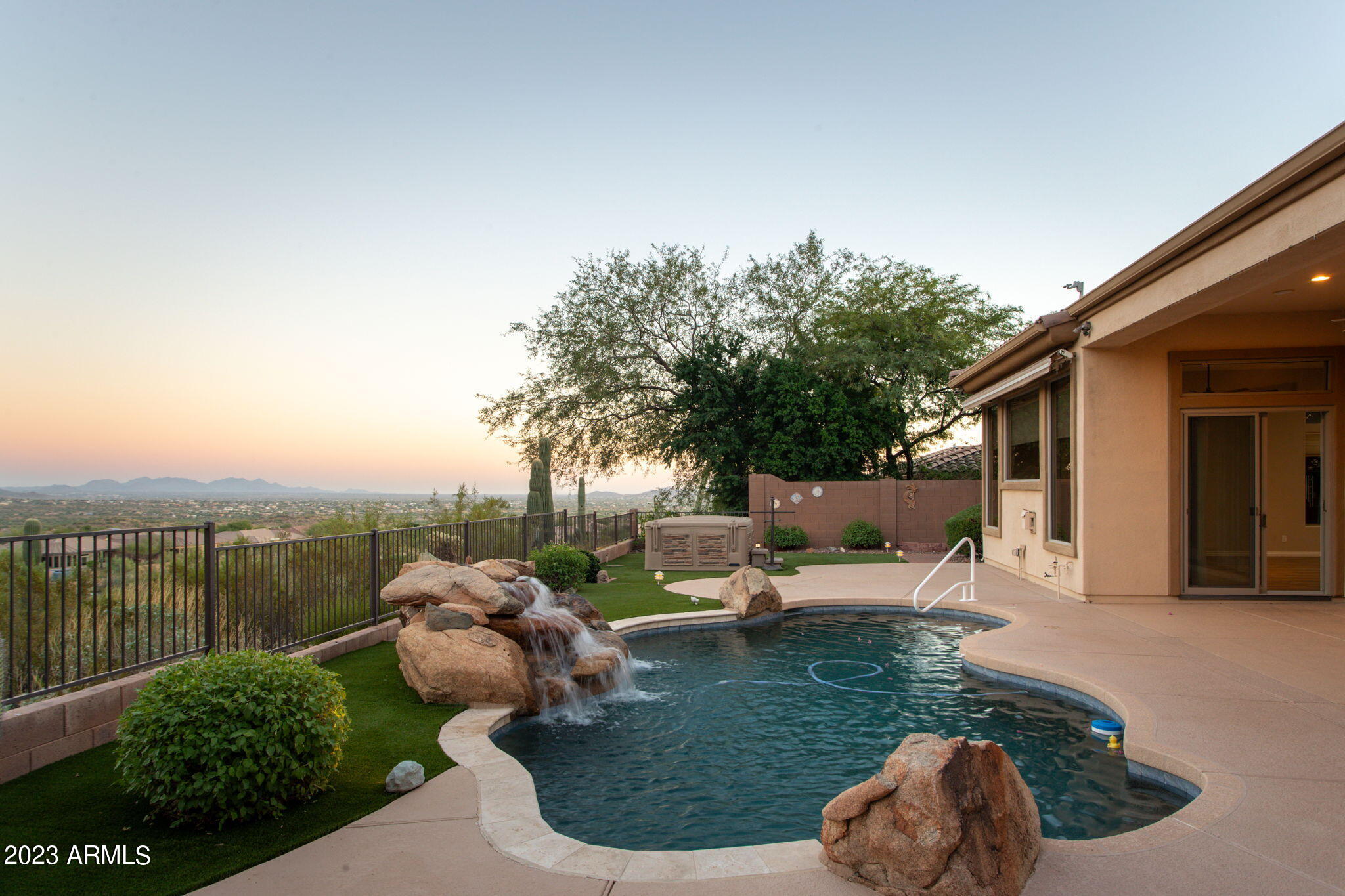 42409 North Back Creek Way Anthem, AZ 85086 - Photo 60 of 87 a view of a couches in patio of the house