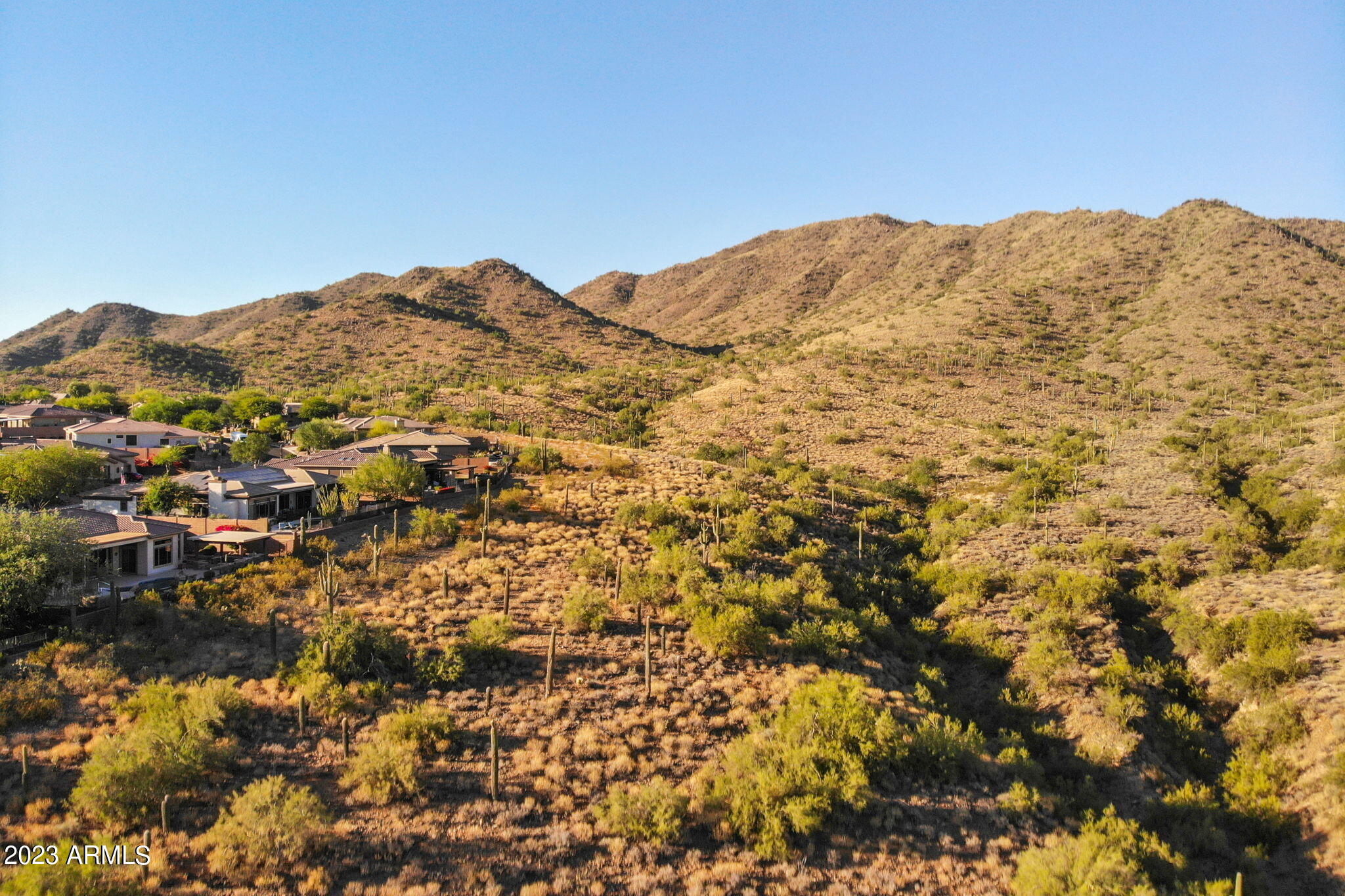 42409 North Back Creek Way Anthem, AZ 85086 - Photo 7 of 87 a view of a large mountain with mountains in the background