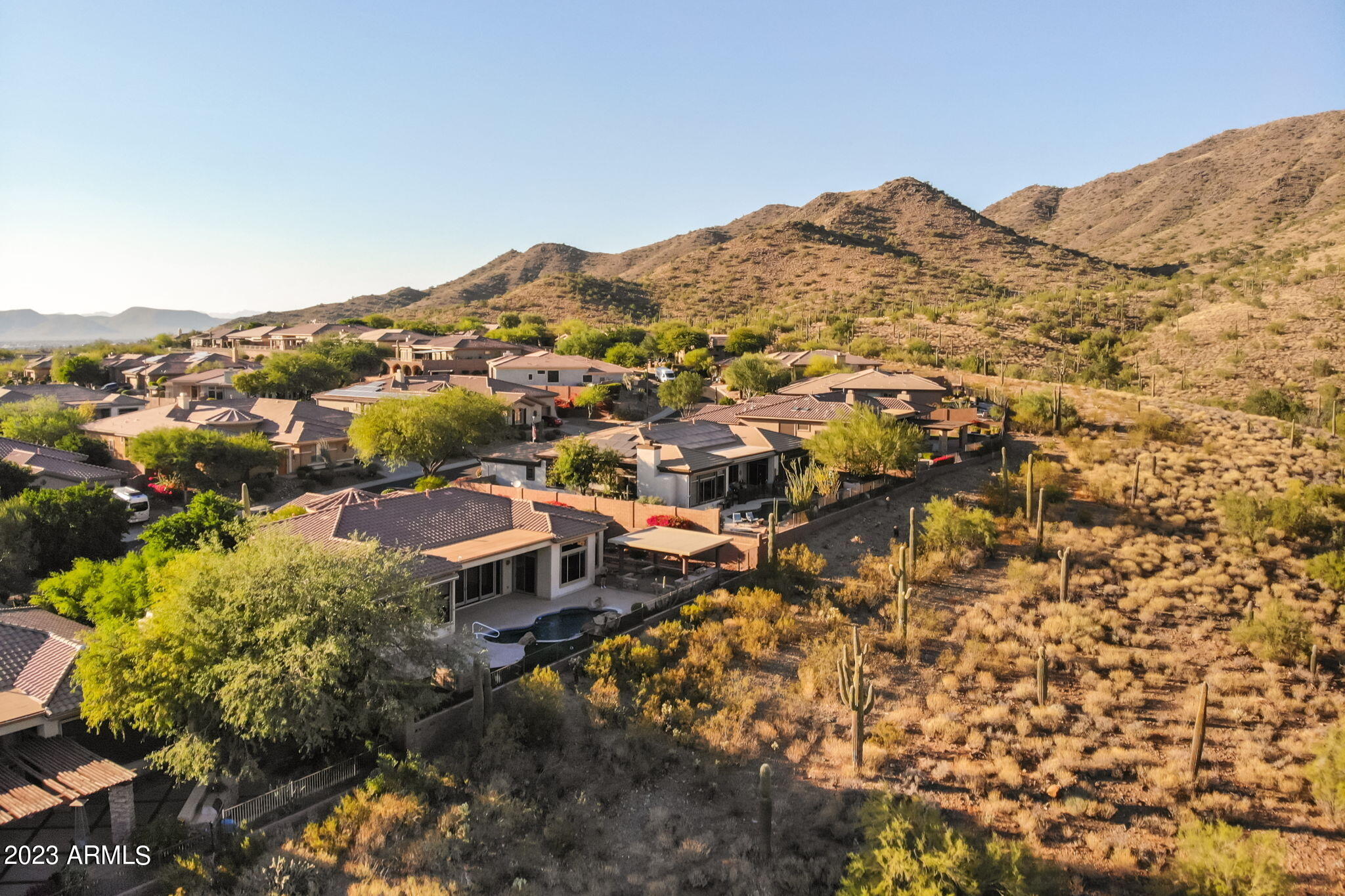 42409 North Back Creek Way Anthem, AZ 85086 - Photo 74 of 87 an aerial view of residential houses with outdoor space and trees