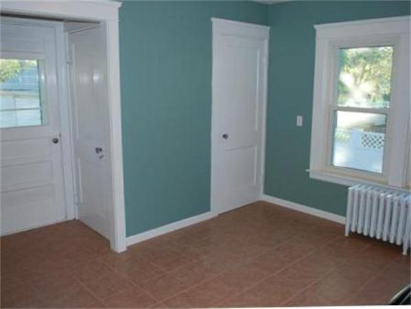 1010 County Road Barrington, RI 02806 - Photo 4 of 17 an empty room with windows and closet