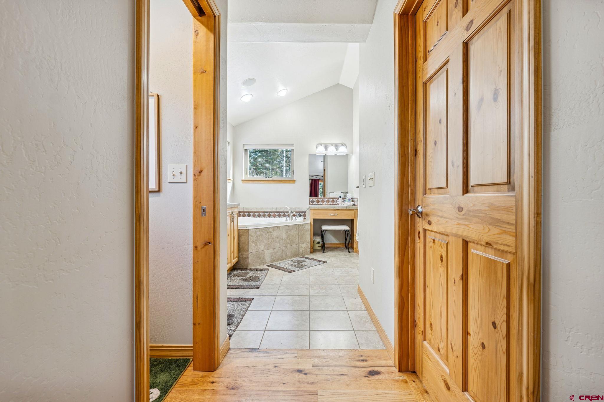 191 Aspen Drive Durango, CO 81301 - Photo 17 of 43 wooden floor with a bathroom