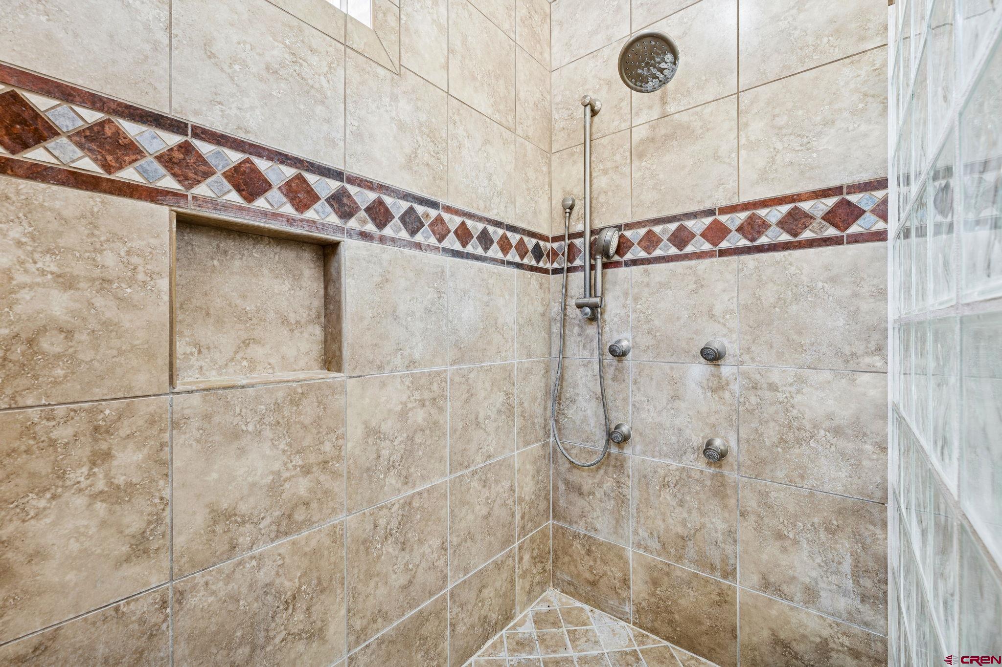 191 Aspen Drive Durango, CO 81301 - Photo 20 of 43 a bathroom with a shower