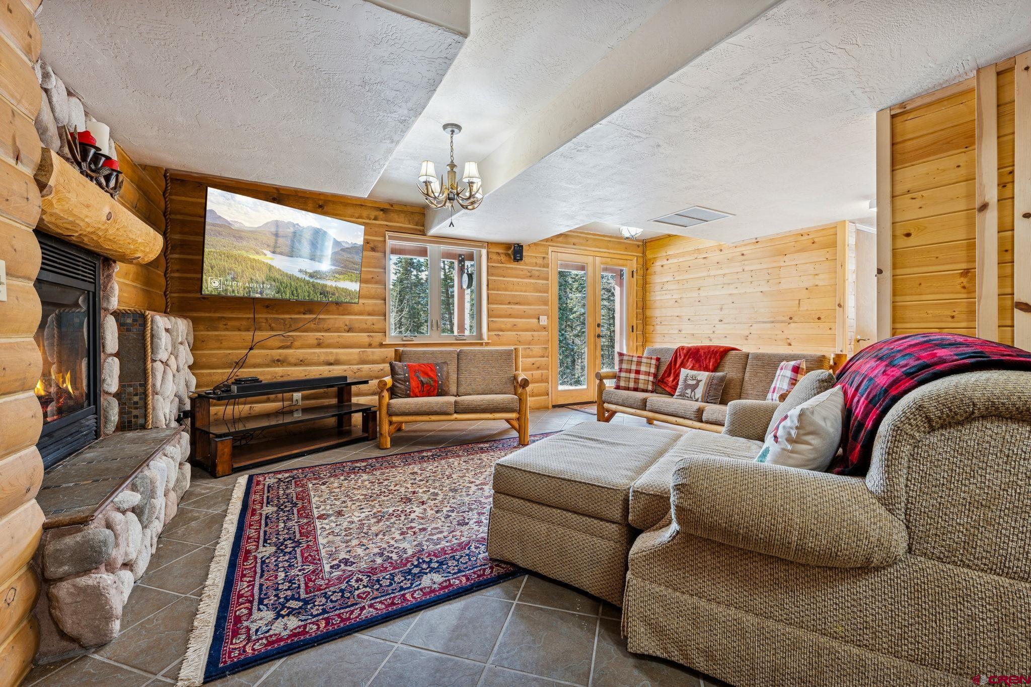 191 Aspen Drive Durango, CO 81301 - Photo 21 of 43 a bedroom with furniture and a large window