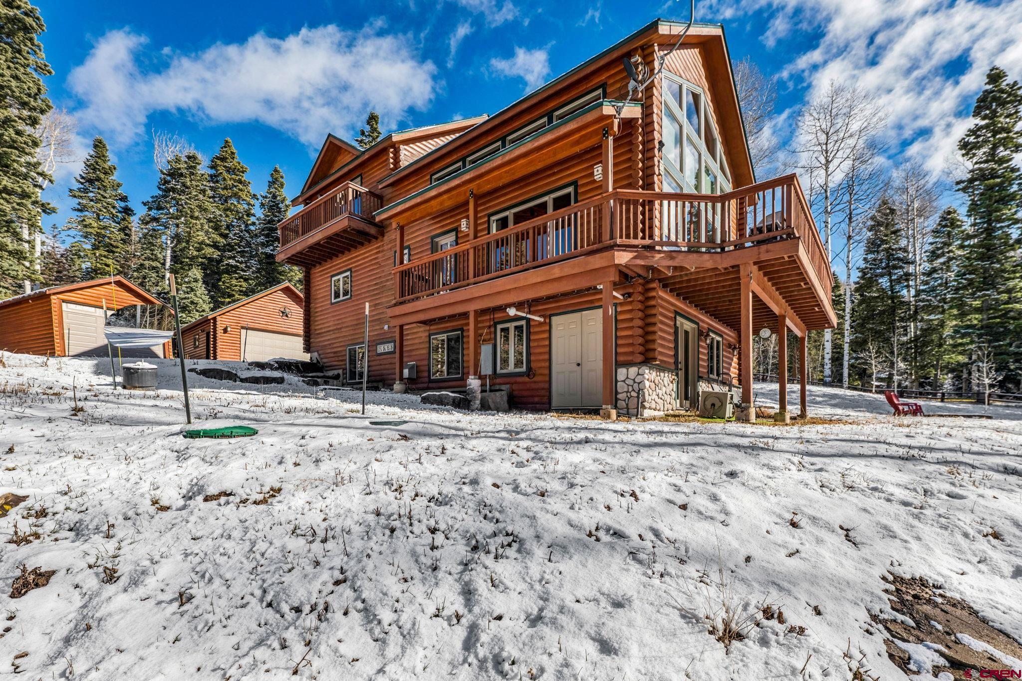 191 Aspen Drive Durango, CO 81301 - Photo 28 of 43 a front view of a house with a yard