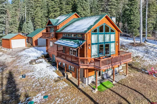 an aerial view of a house with balcony