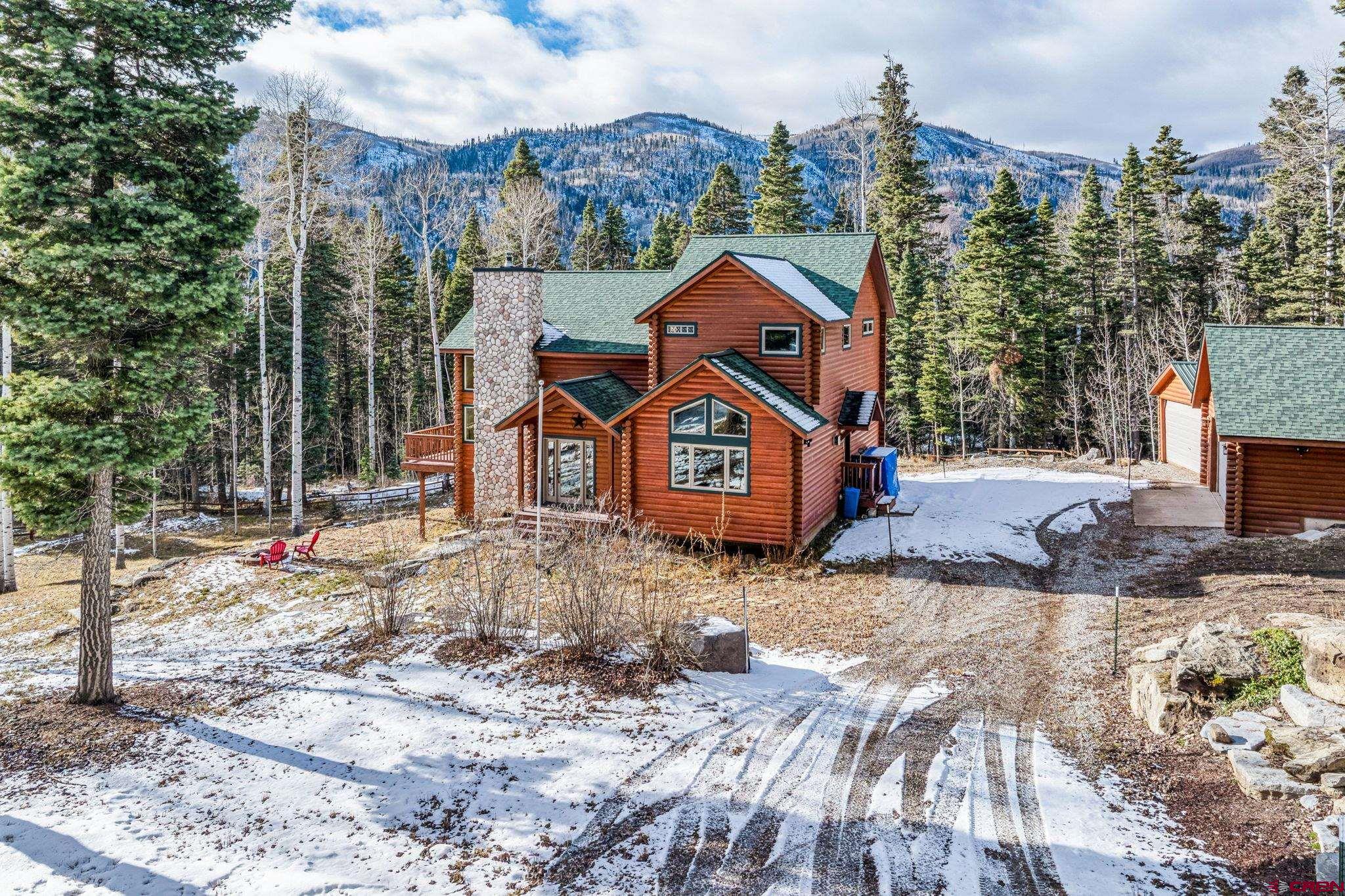 191 Aspen Drive Durango, CO 81301 - Photo 32 of 43 a front view of a house with a yard
