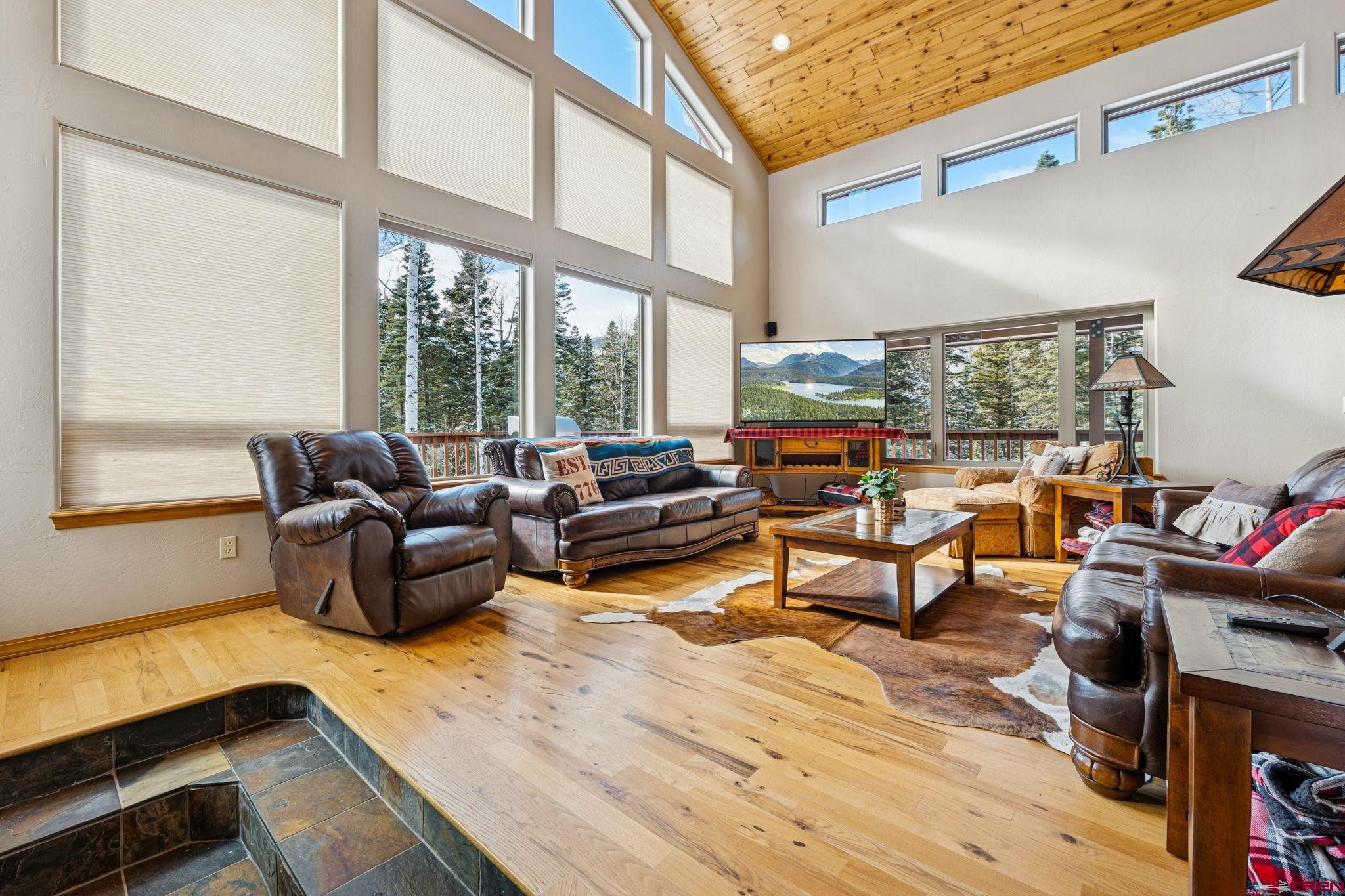 191 Aspen Drive Durango, CO 81301 - Photo 9 of 43 a living room with furniture and a large window