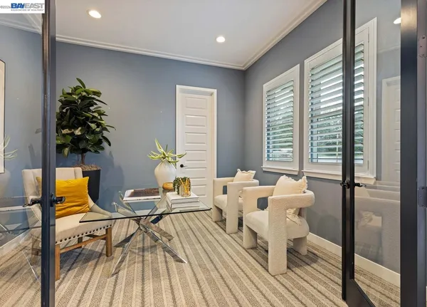 a kitchen with stainless steel appliances granite countertop a sink a stove and a wooden floors