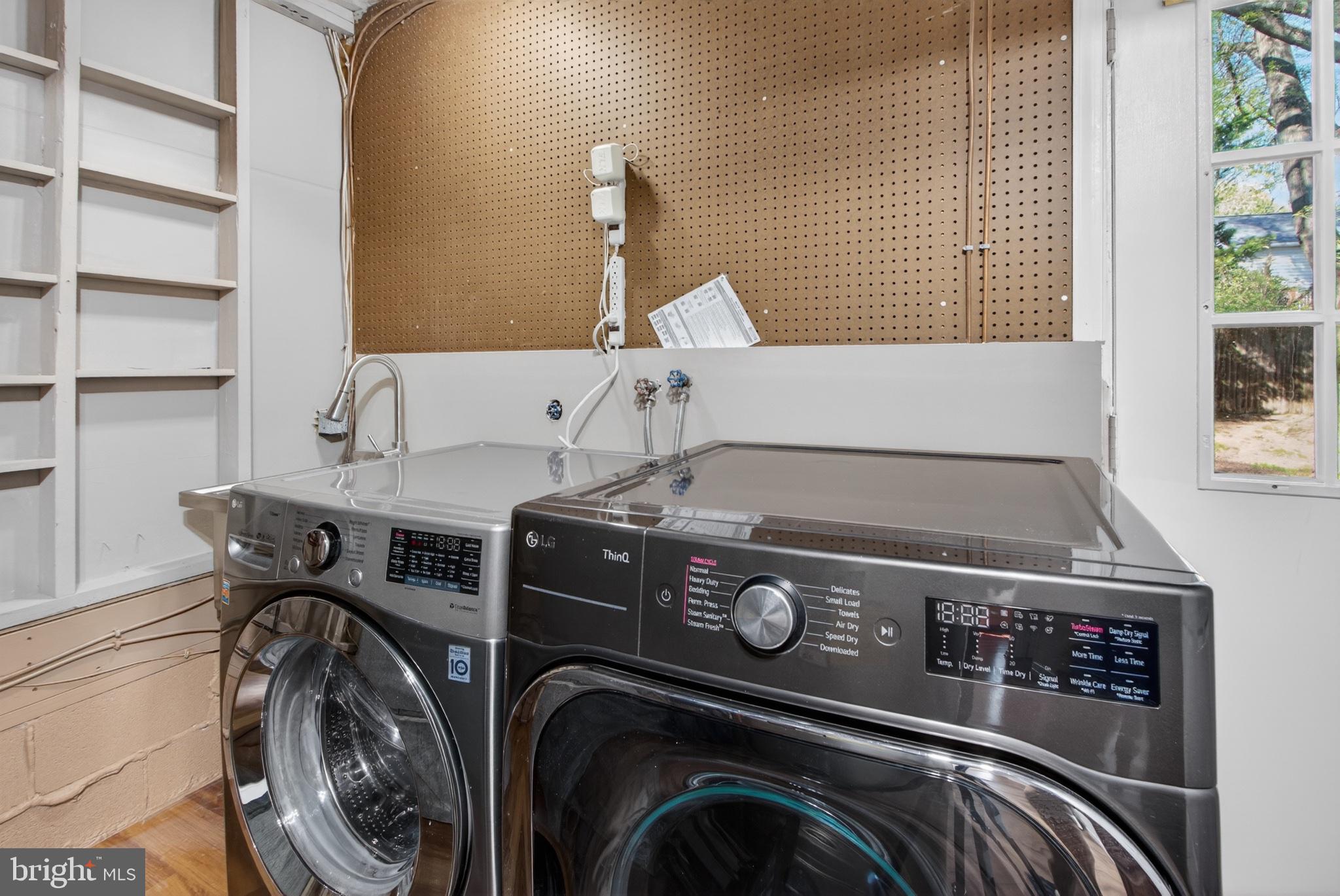 16 Redding Ridge Drive Gaithersburg, MD 20878 - Photo 18 of 53 Modern laundry space with sleek appliances.