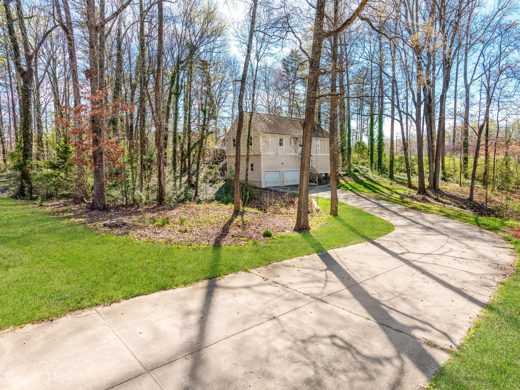 2429 Dellinger Circle Charlotte, NC 28269 - Photo 2 of 40 a view of backyard with swimming pool