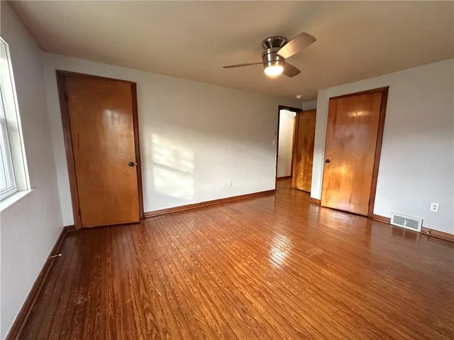 a bathroom with a sink toilet a mirror and shower