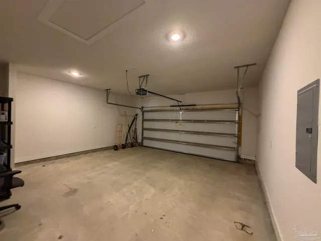 a view of room with stairs and a cabinet