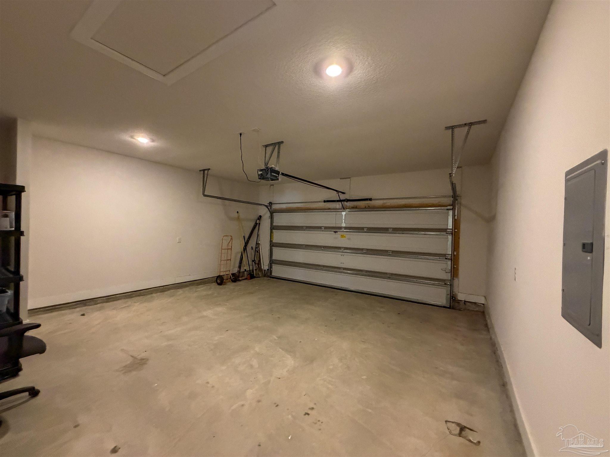 7429 Jamesville Road Pensacola, FL 32526 - Photo 23 of 24 a view of room with stairs and a cabinet