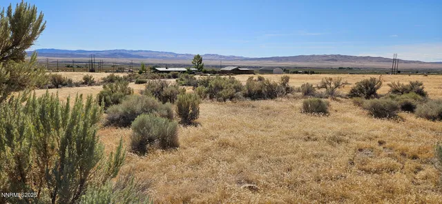 a view of a lake with a mountain in the background