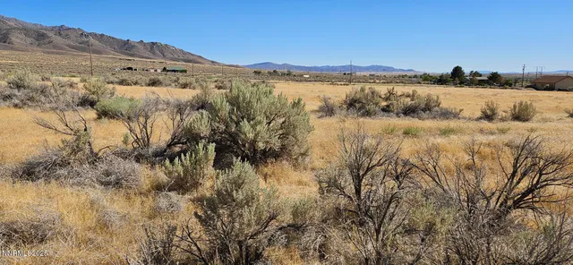 a view of lake with mountain