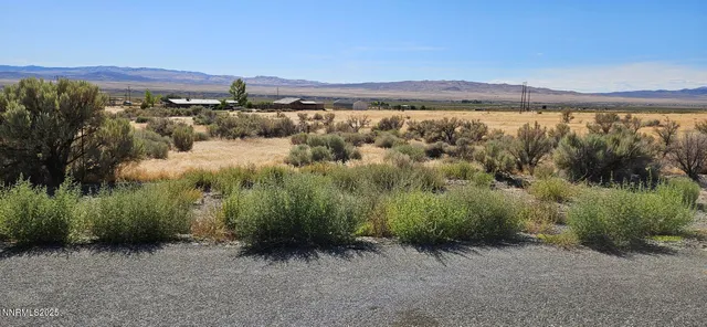 a view of a lake with a mountain in the background