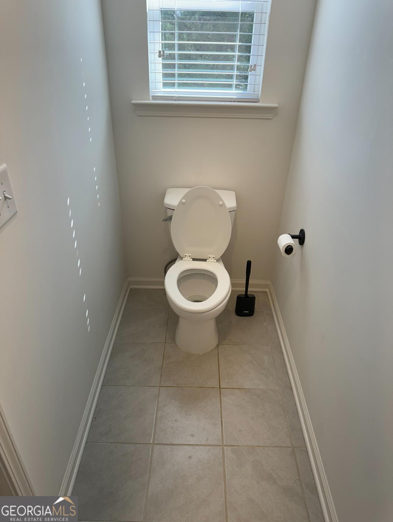 844 Venture Way Atlanta, GA 30331 - Photo 17 of 37 a bathroom with a toilet