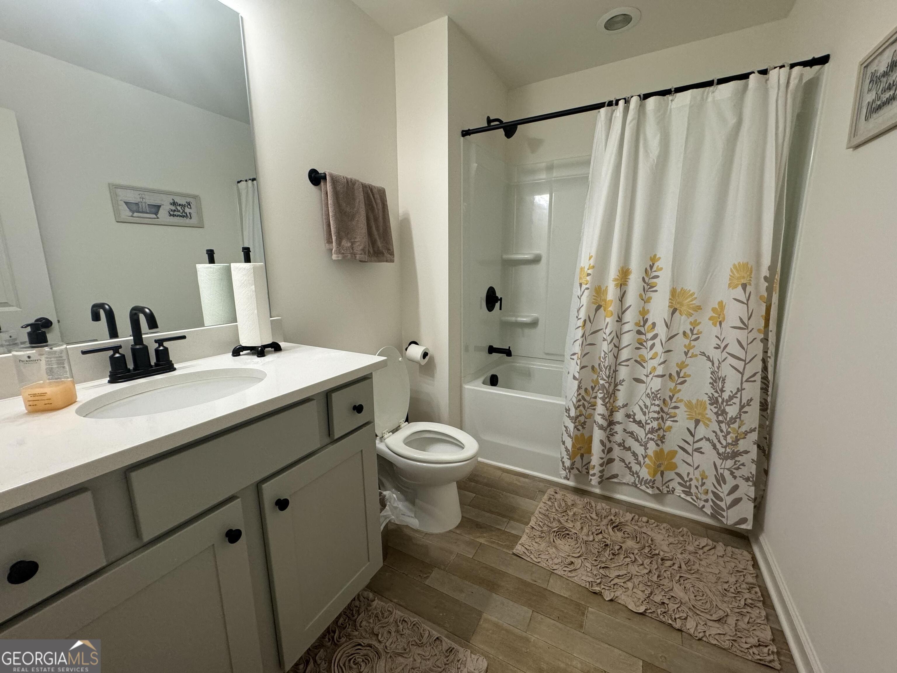 844 Venture Way Atlanta, GA 30331 - Photo 20 of 37 a bathroom with a toilet sink and shower