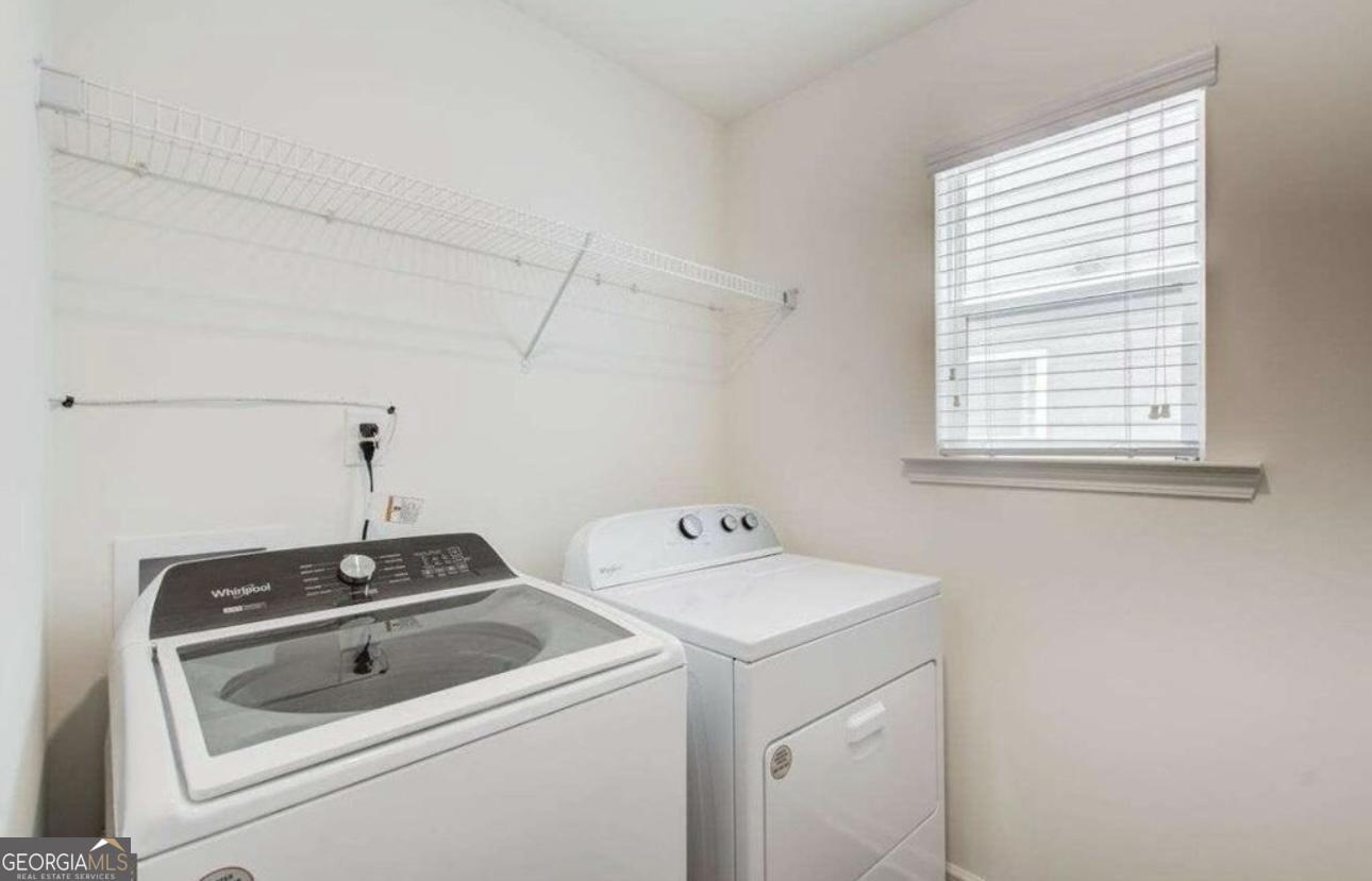 844 Venture Way Atlanta, GA 30331 - Photo 21 of 37 a utility room with dryer and washer