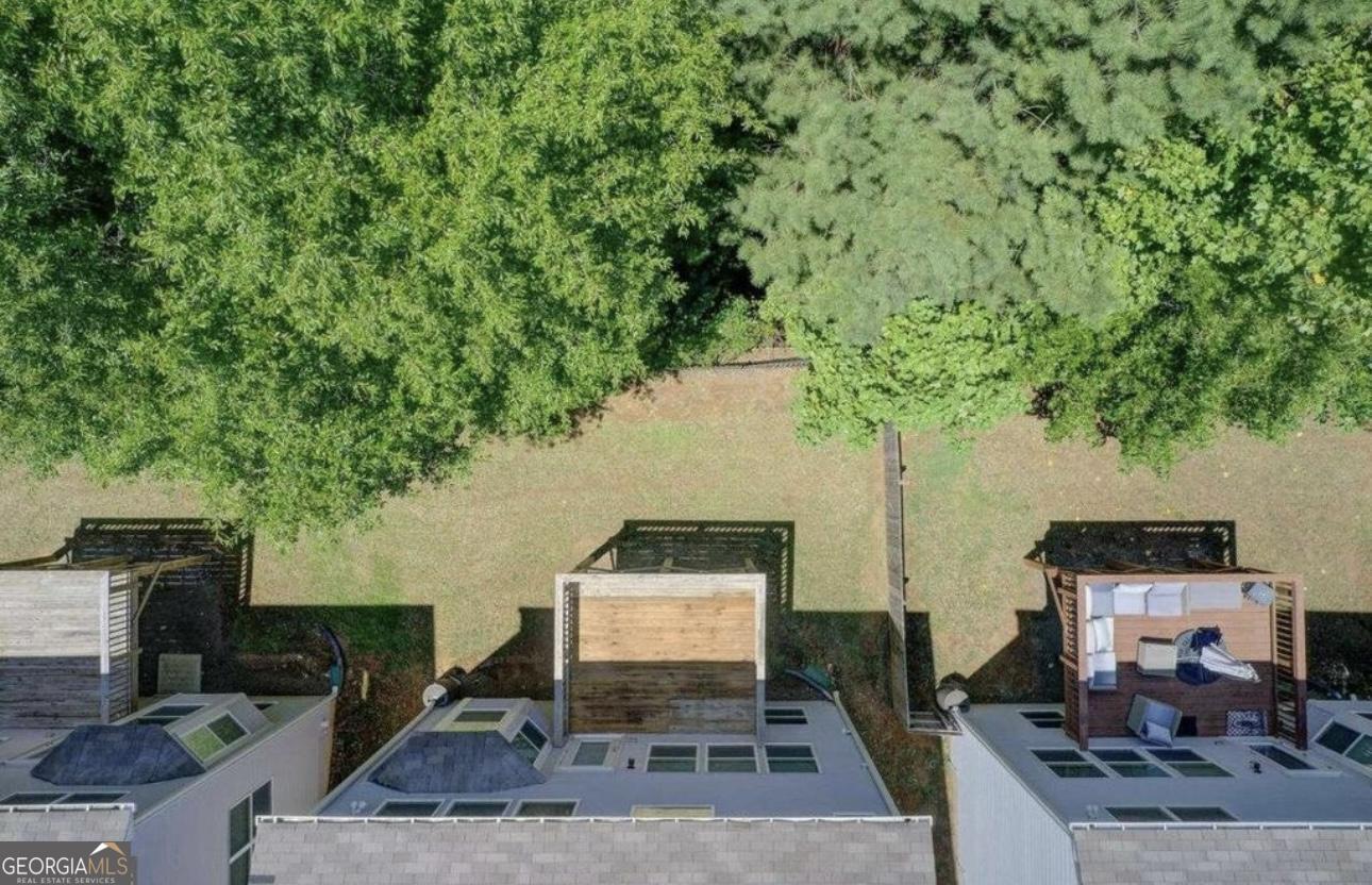 844 Venture Way Atlanta, GA 30331 - Photo 22 of 37 a backyard of a house with seating space