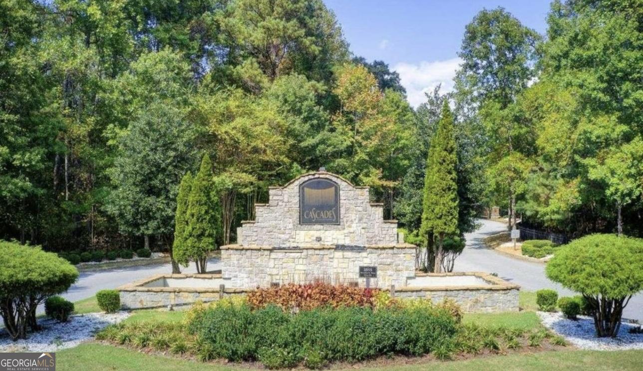 844 Venture Way Atlanta, GA 30331 - Photo 36 of 37 a front view of a house with a yard and trees