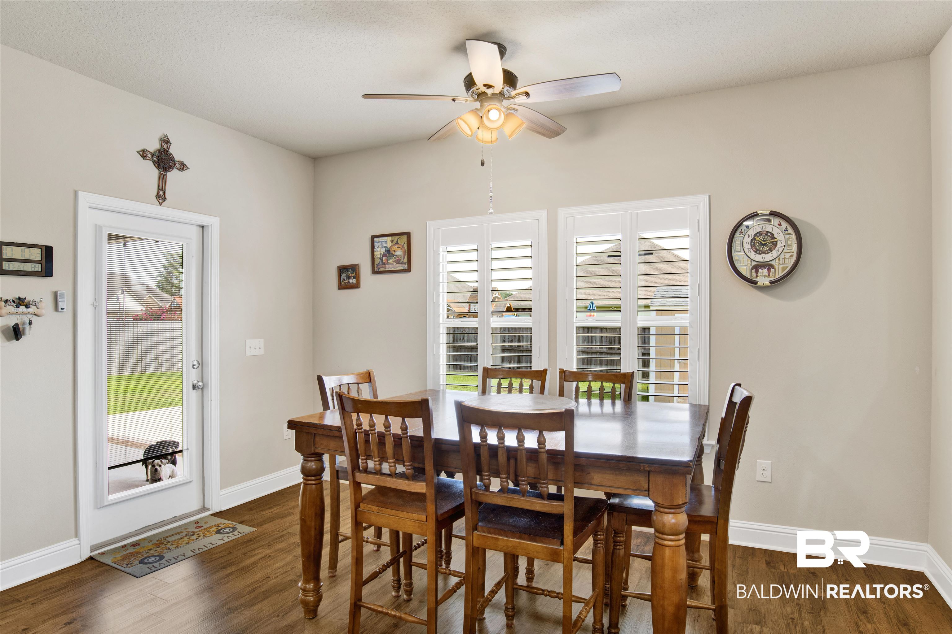278 Silo Loop Fairhope, AL 36532 - Photo 9 of 26 Dining area with a ceiling fan and wood finished floors