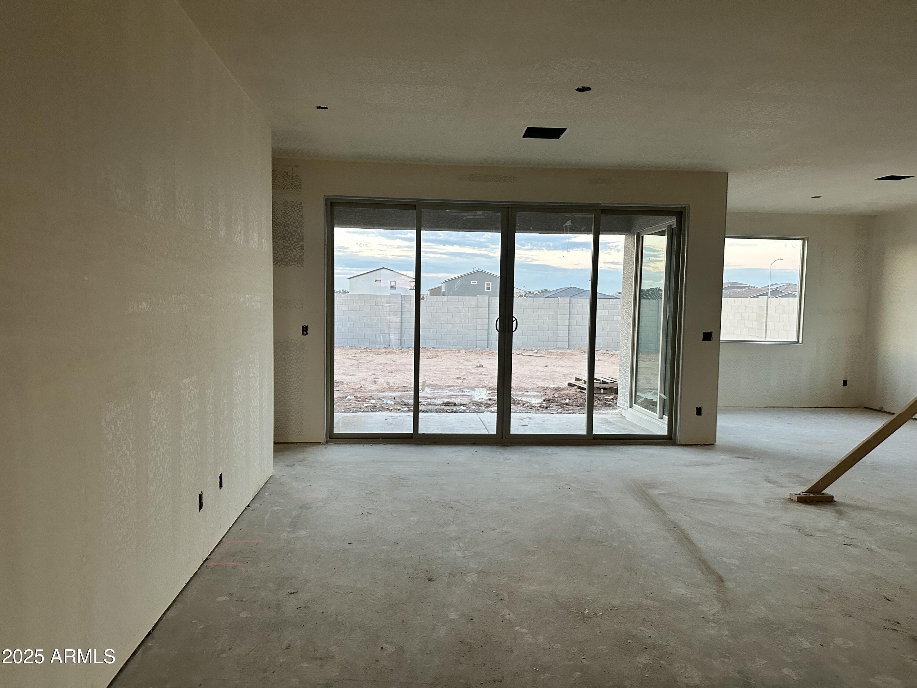 5536 West Piedmont Road Laveen, AZ 85339 - Photo 4 of 25 an empty room with windows