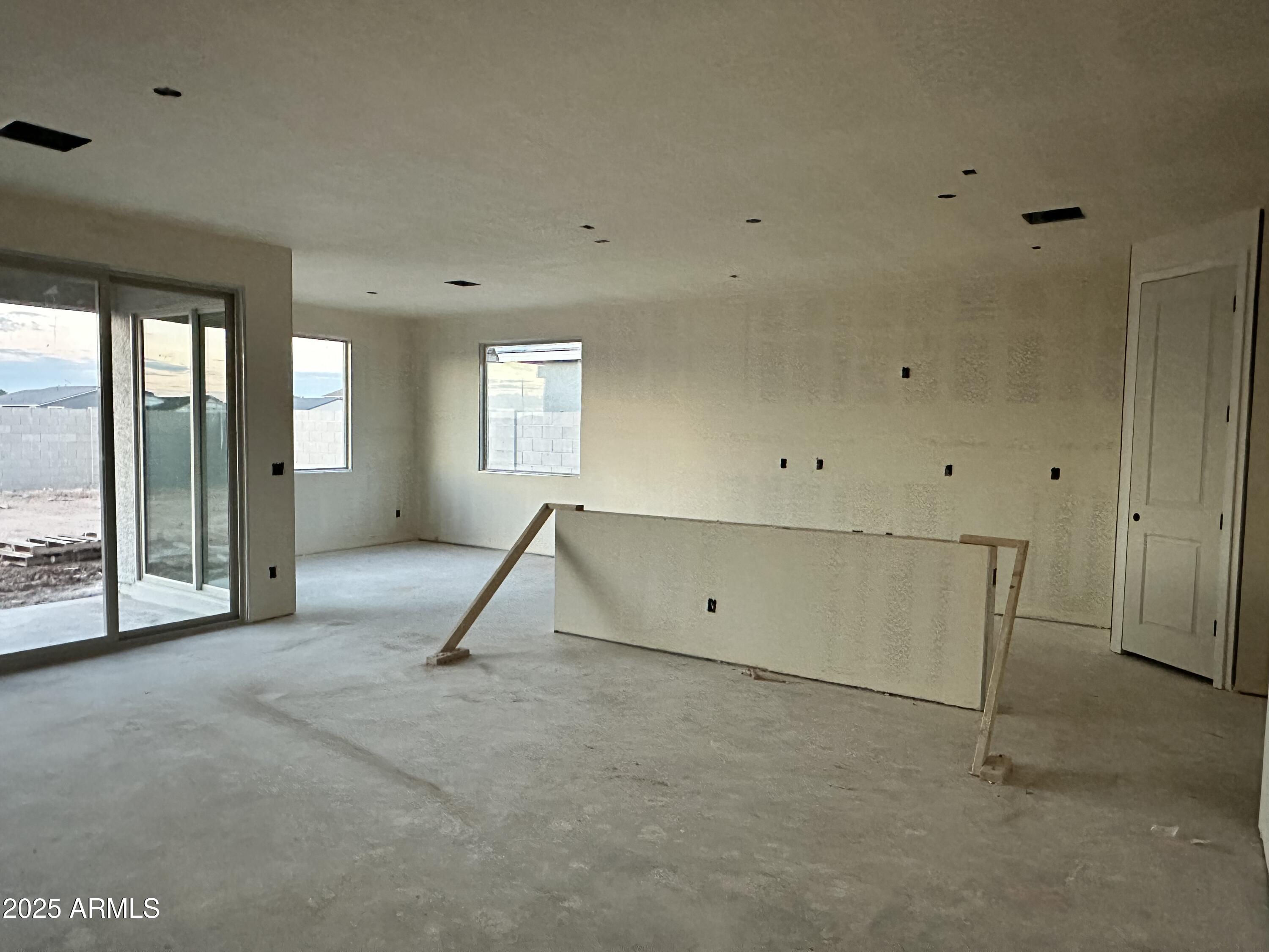 5536 West Piedmont Road Laveen, AZ 85339 - Photo 8 of 25 a view of a room with gym equipment and windows