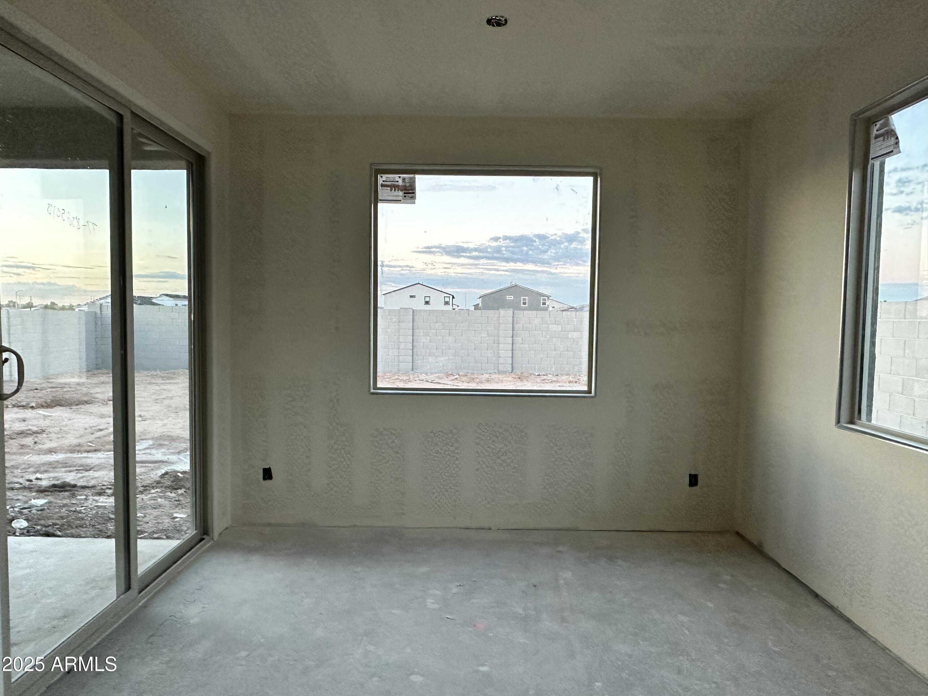 5536 West Piedmont Road Laveen, AZ 85339 - Photo 9 of 25 a view of an empty room with a window