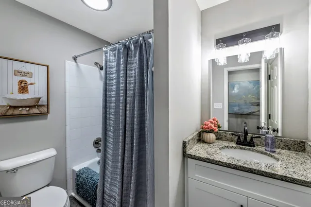 a house with trees in the background