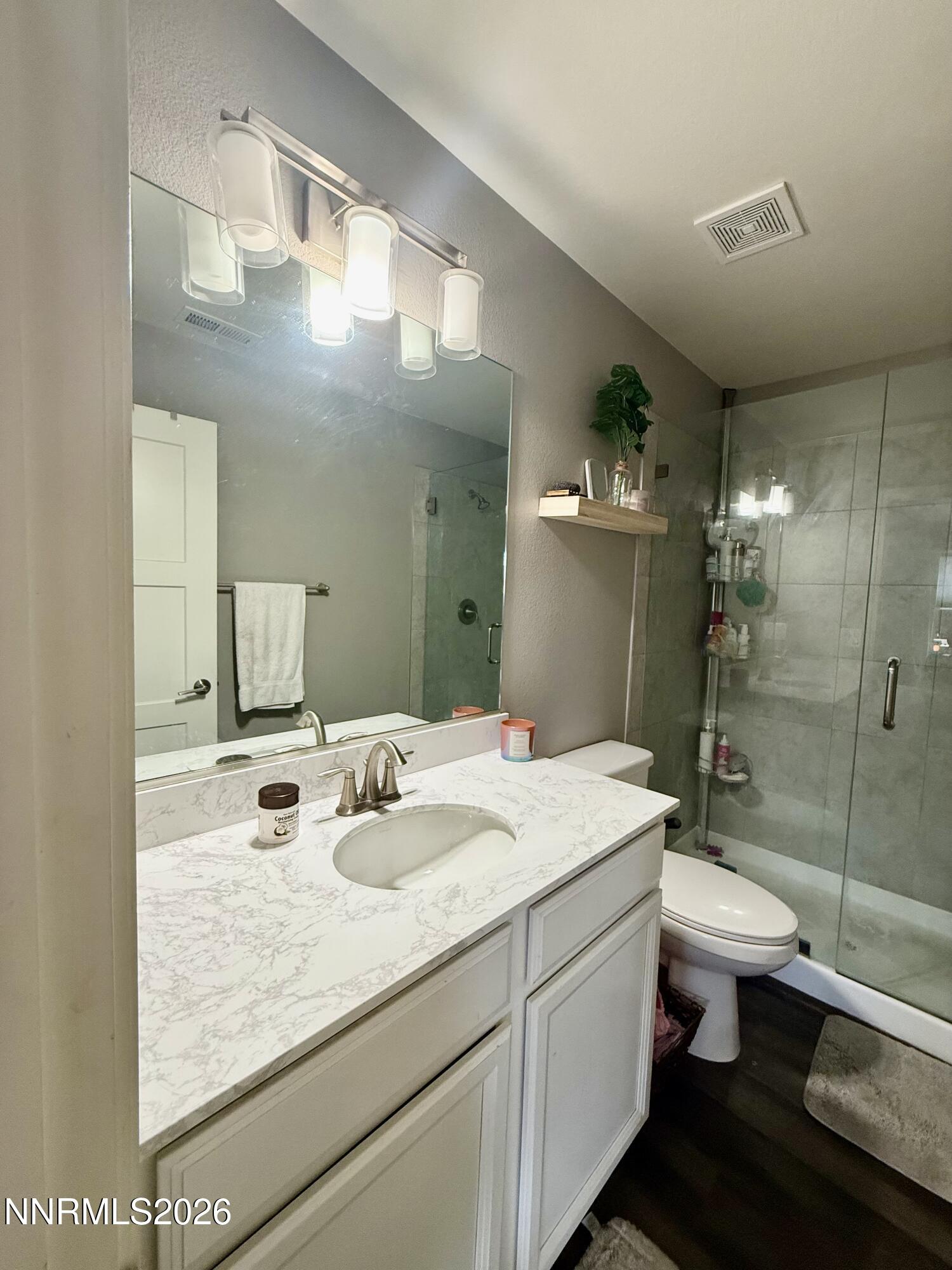 1310 Handelin Road Carson City, NV 89706 - Photo 20 of 40 a bathroom with a sink toilet and shower