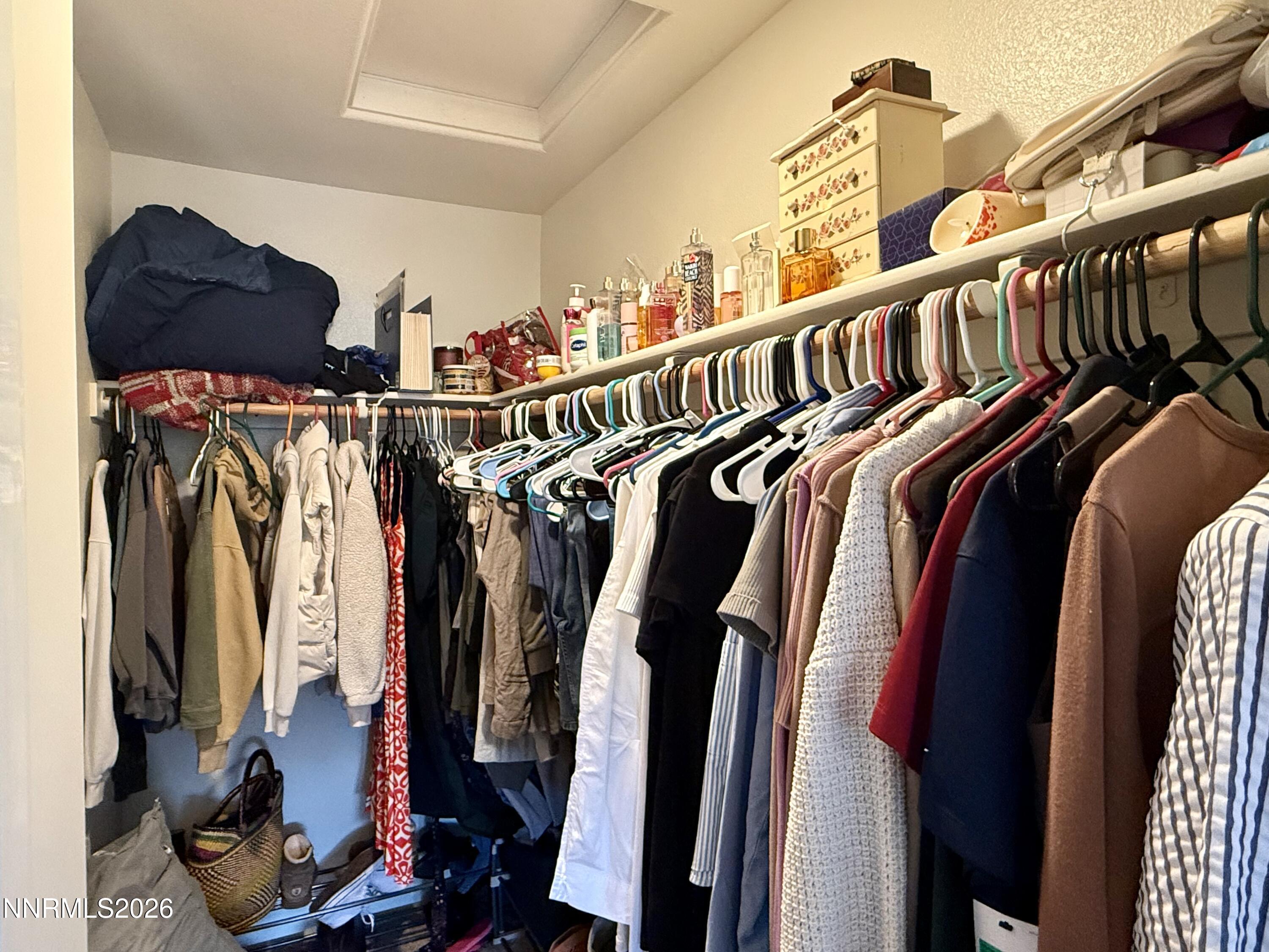 1310 Handelin Road Carson City, NV 89706 - Photo 22 of 40 a view of walk in closet with clothes and shoes