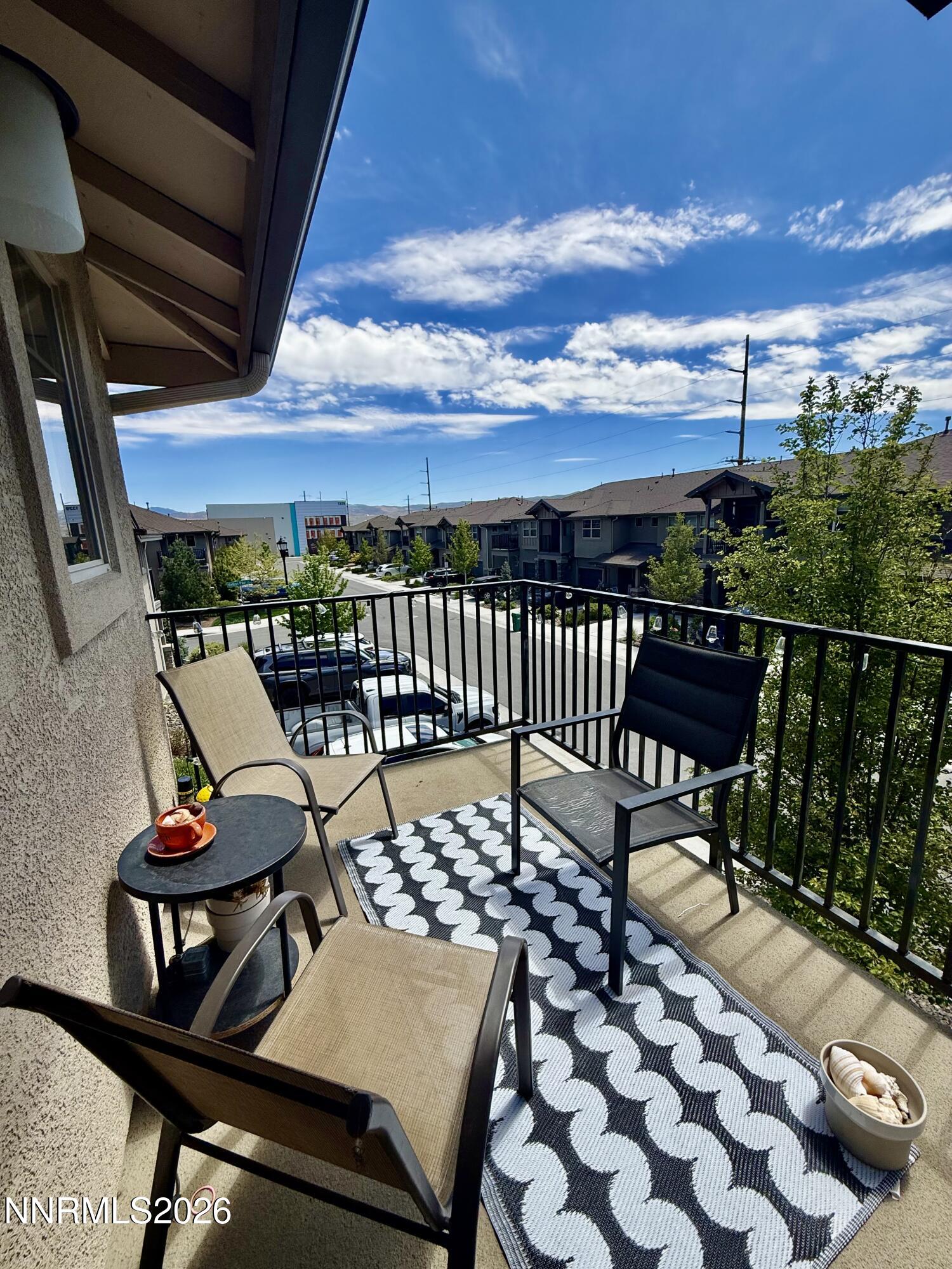 1310 Handelin Road Carson City, NV 89706 - Photo 23 of 40 a view of a chairs and table in the balcony