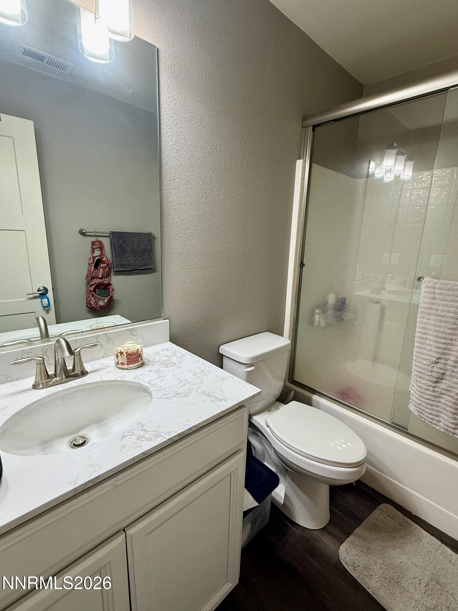 1310 Handelin Road Carson City, NV 89706 - Photo 26 of 40 a bathroom with a sink toilet and shower