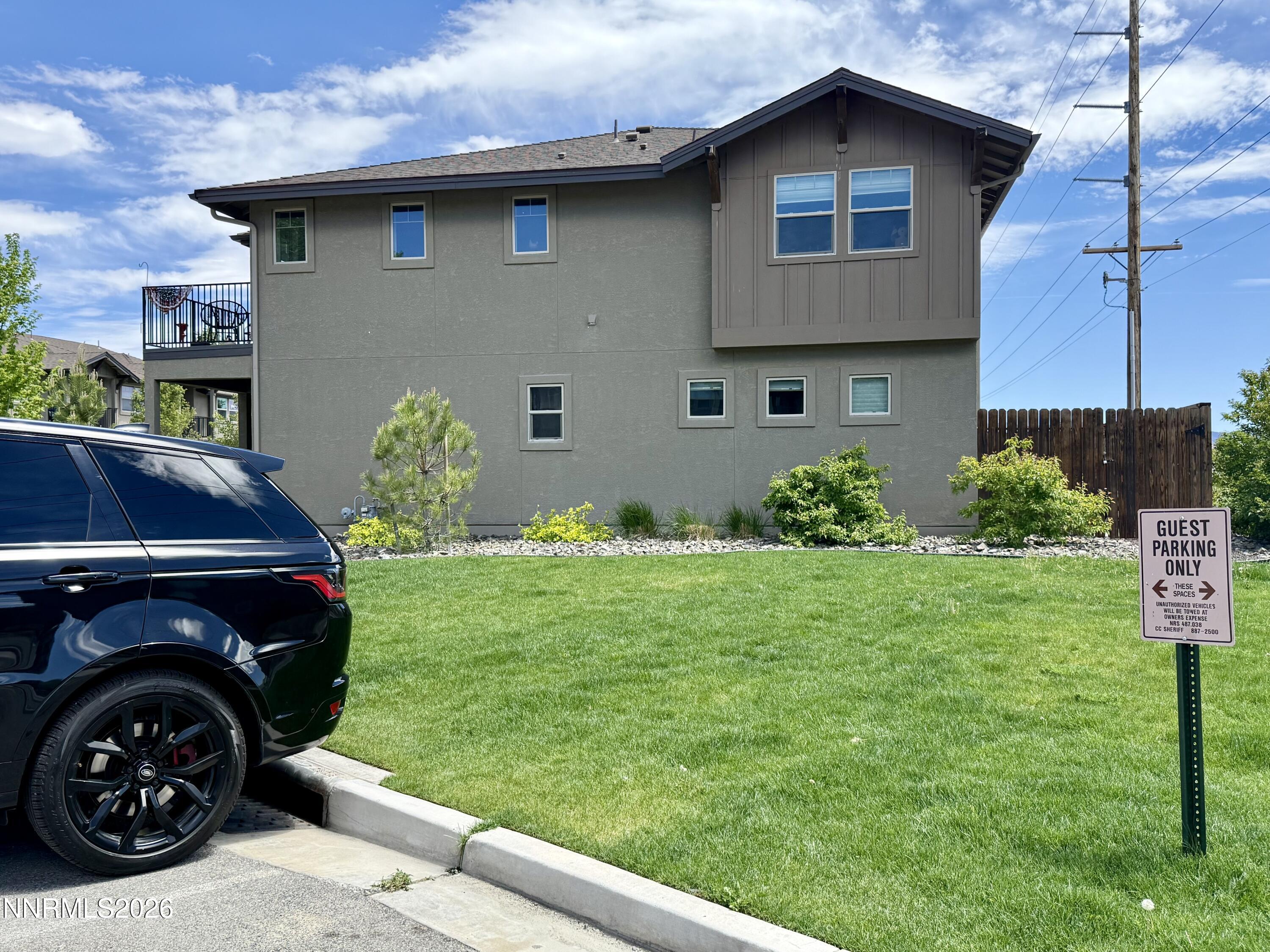 1310 Handelin Road Carson City, NV 89706 - Photo 3 of 40 a view of a house with a back yard
