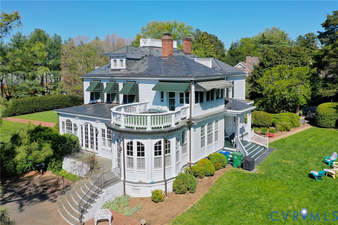 Shows brick patio & second level deck